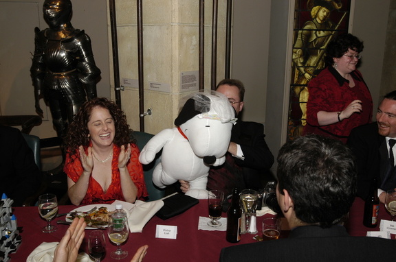 Lis applauds the presentation of Snoopy