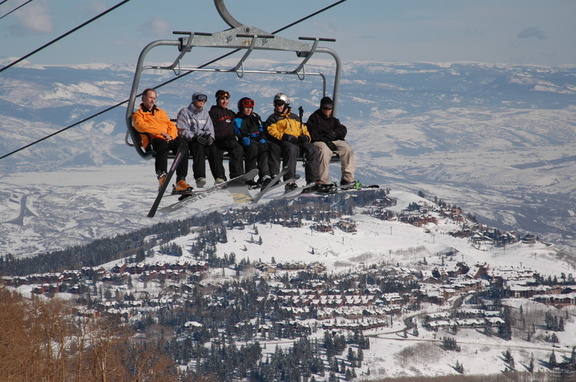 Happy skiers on the lift