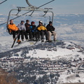 Happy skiers on the lift