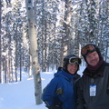 Kat and Bob skiing in the woods