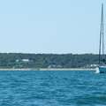Sailboat under power coming out of Edgartown harbor