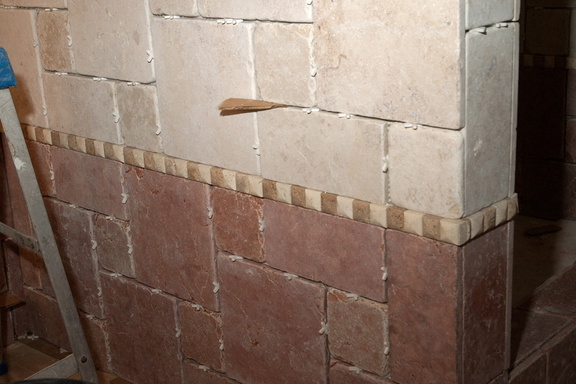 Detail of the border between red and light tiles
